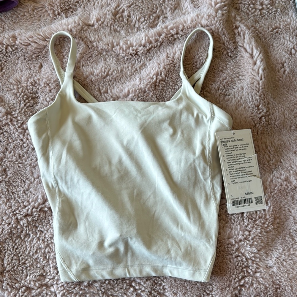 Strappy align material tank